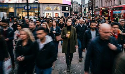 Sovereign existence and emotional independence — woman holding key to inner peace in chaotic world